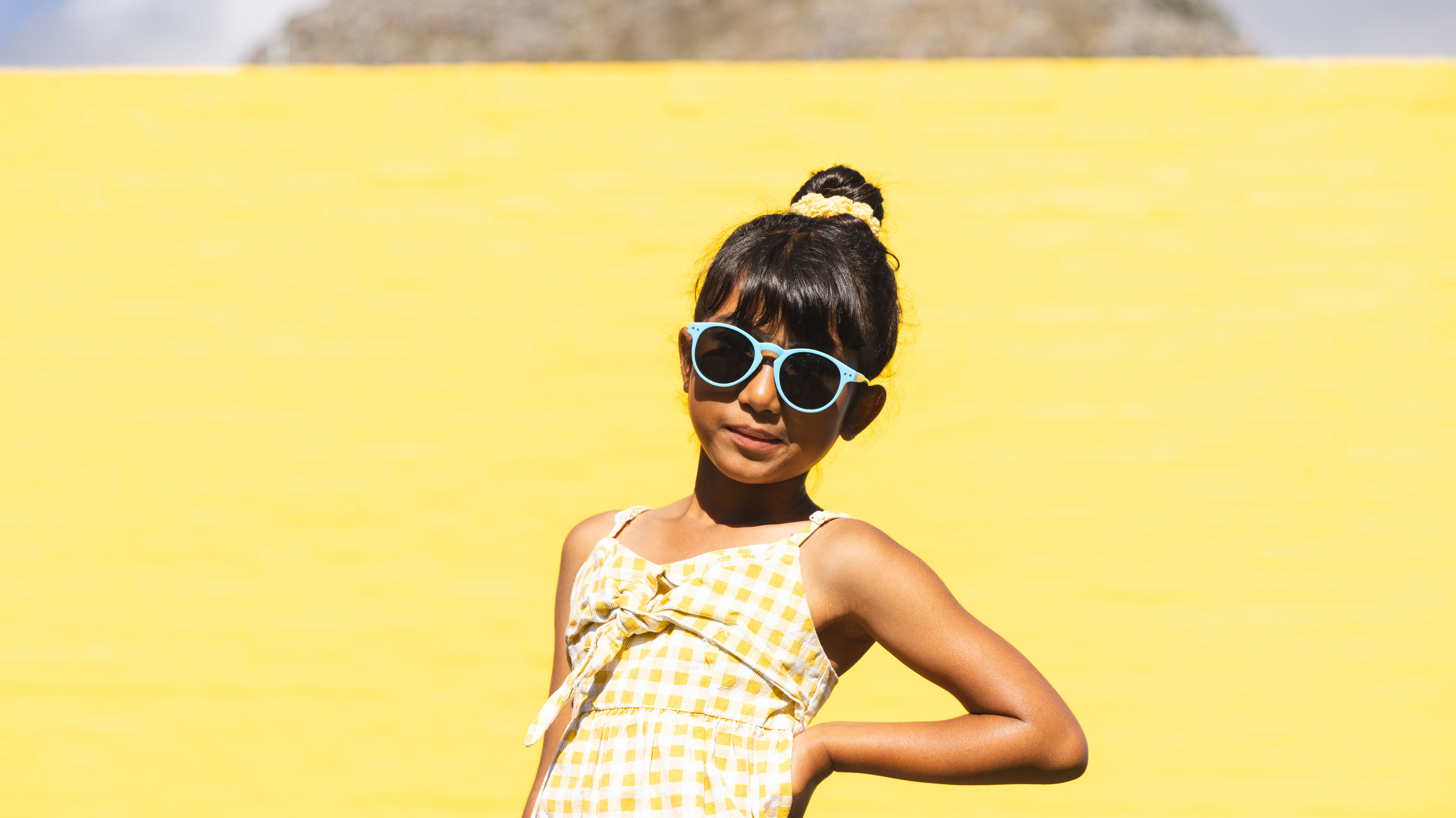 A girl wearing sunglass
