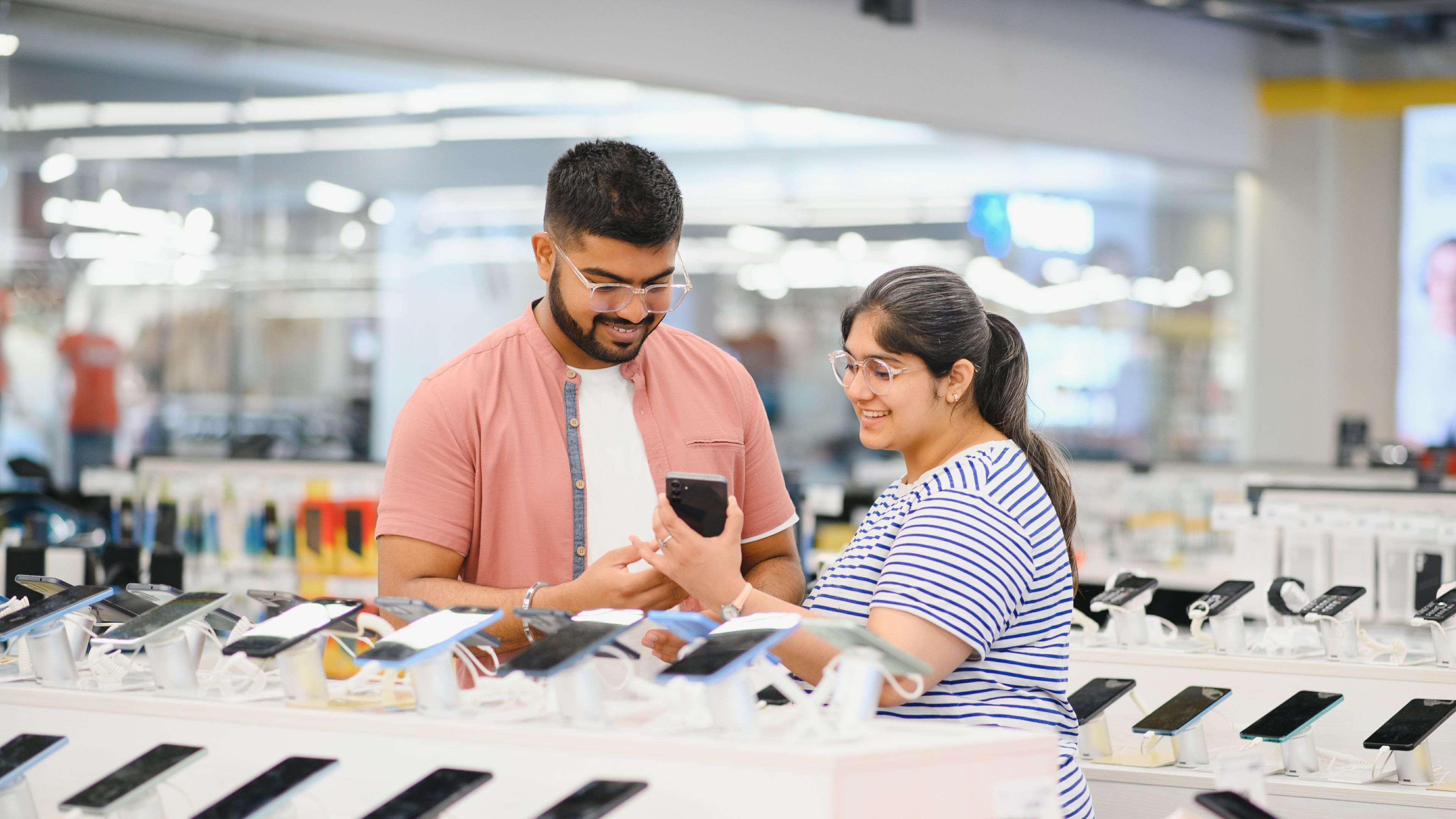 Couple looking at mobile phone