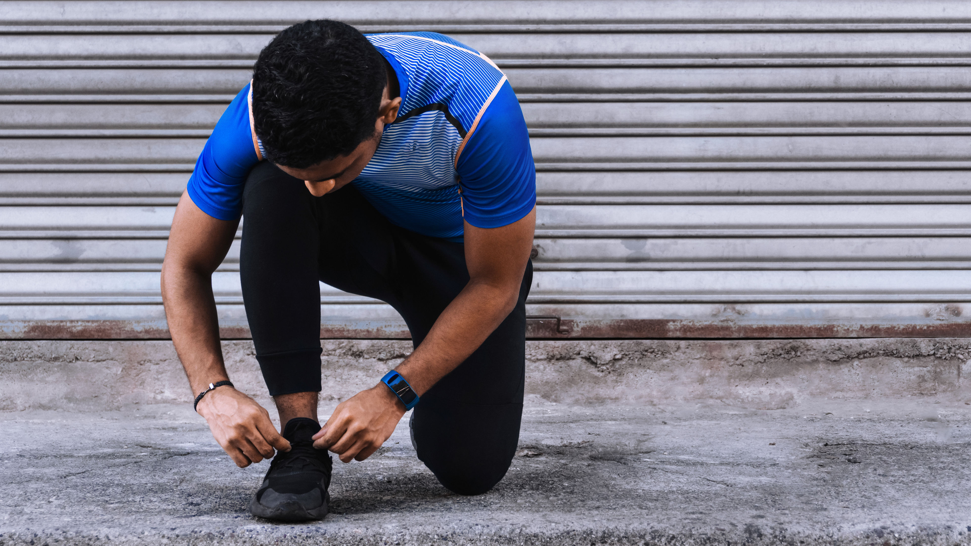 Man tying his shoelace