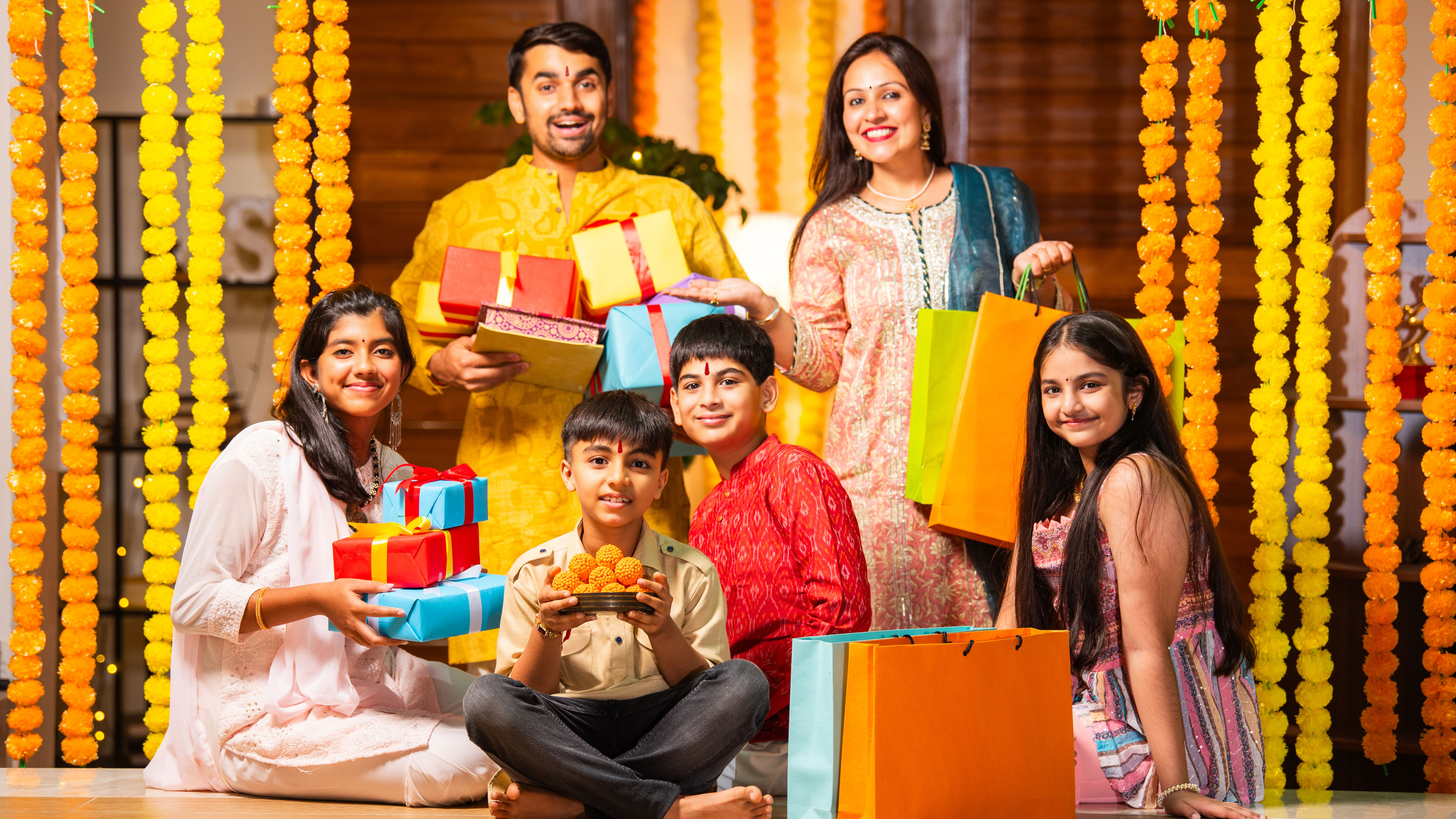 Smiling family with gifts 
