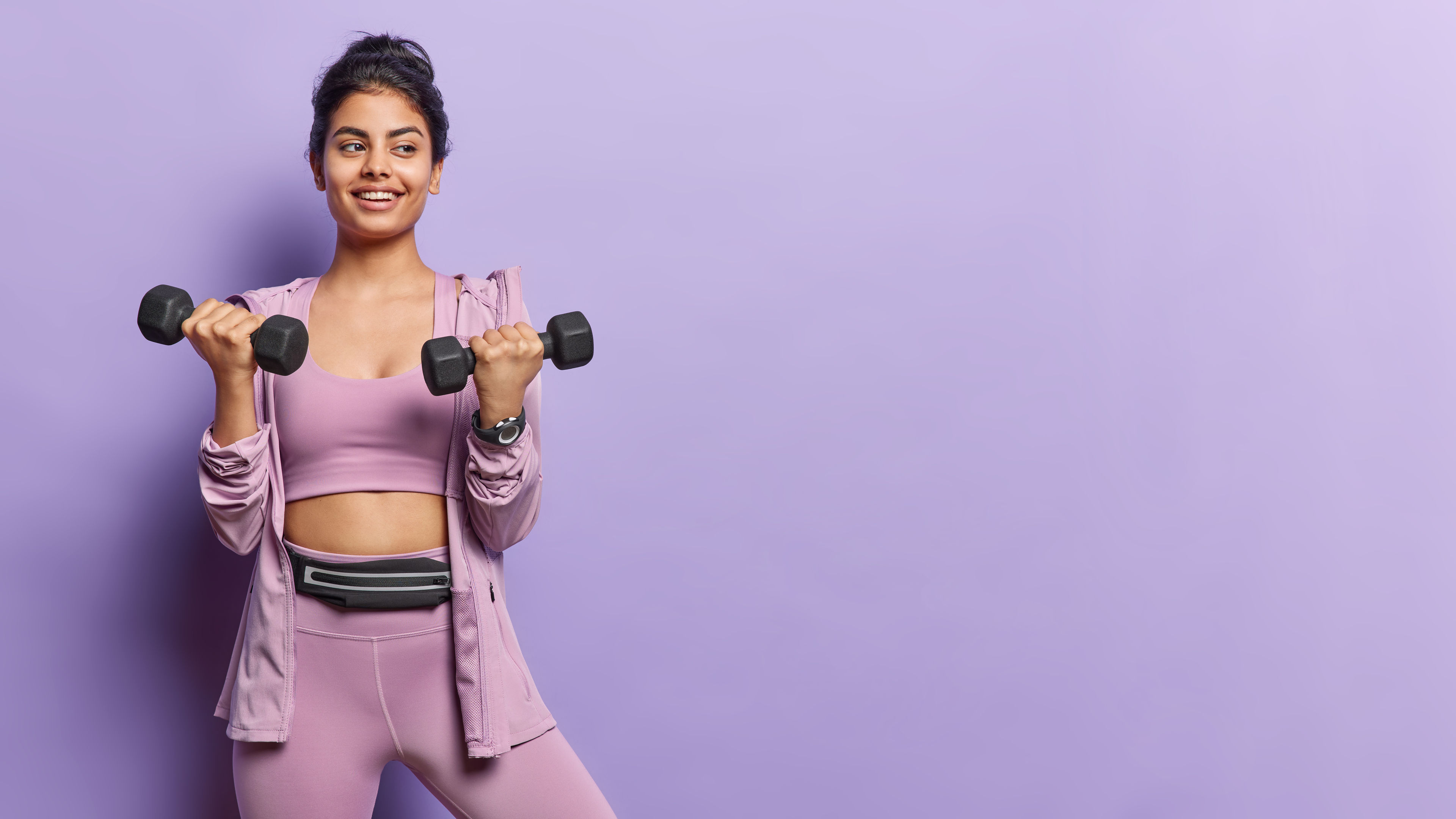 Women holding Dumbell 